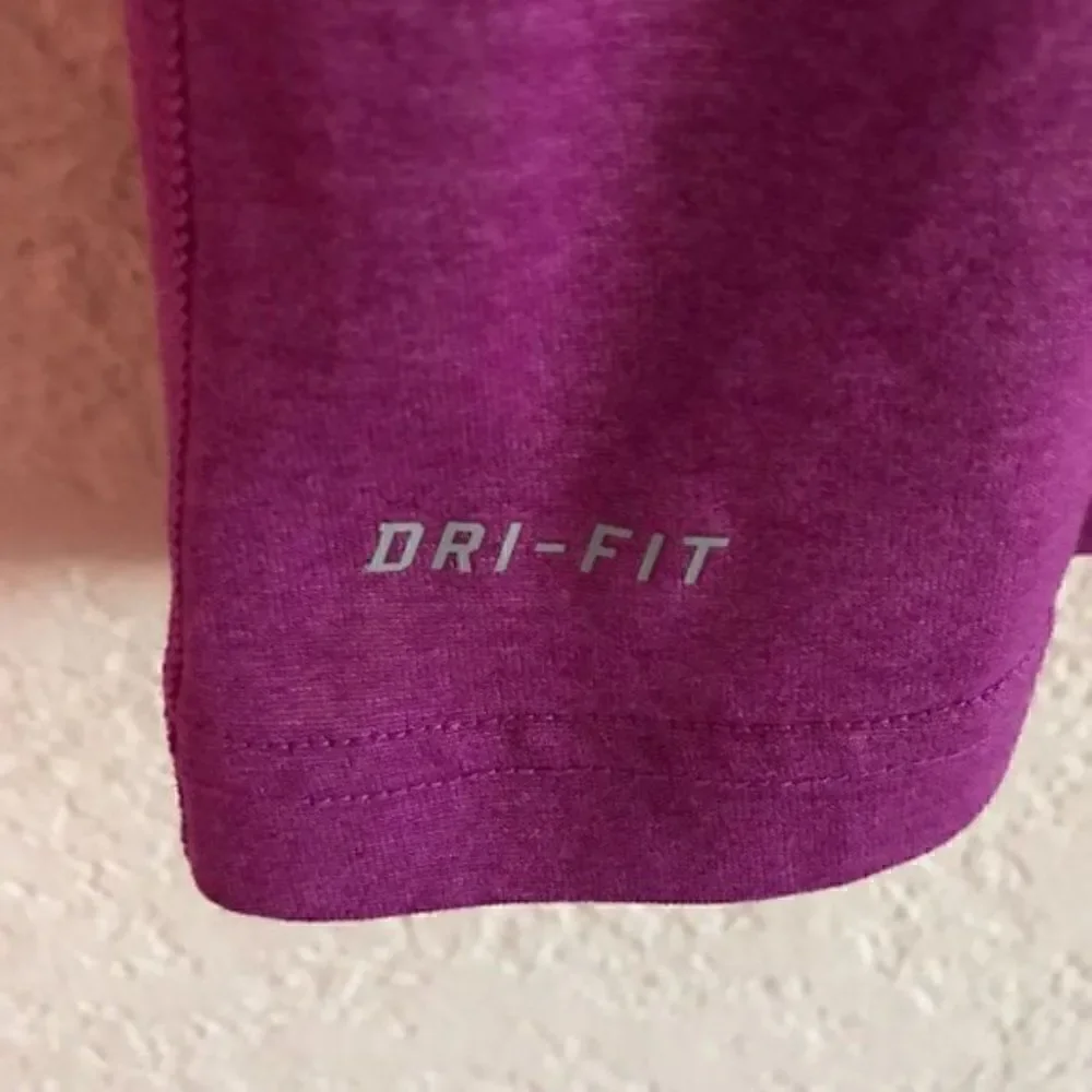 *30off3* NWOT. Nike Dri-Fit Purple Top